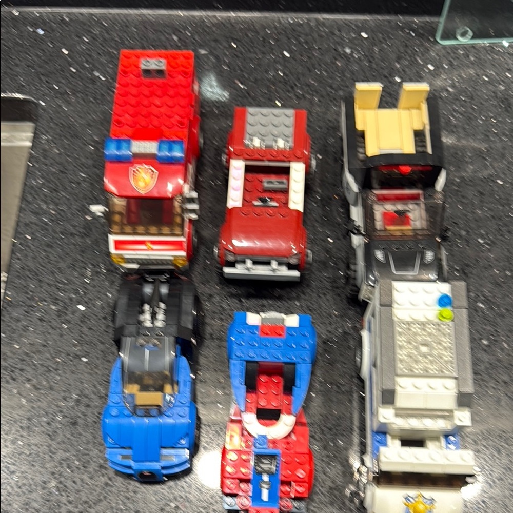 Miscellaneous Lego cars missing a few pieces